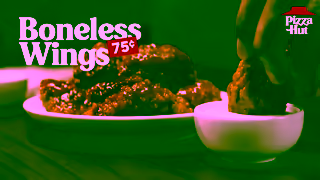 Pizza Hut Boneless Wings now 75 each Try in our 9 different flavors and dry rubs Ad Commercial Brand Imagery Photoshoot 0