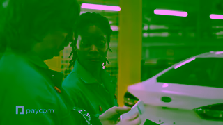 Paycom Unnecessary Action Hero Episode 3 Assembly Line Ad Commercial Brand Imagery Photoshoot 0